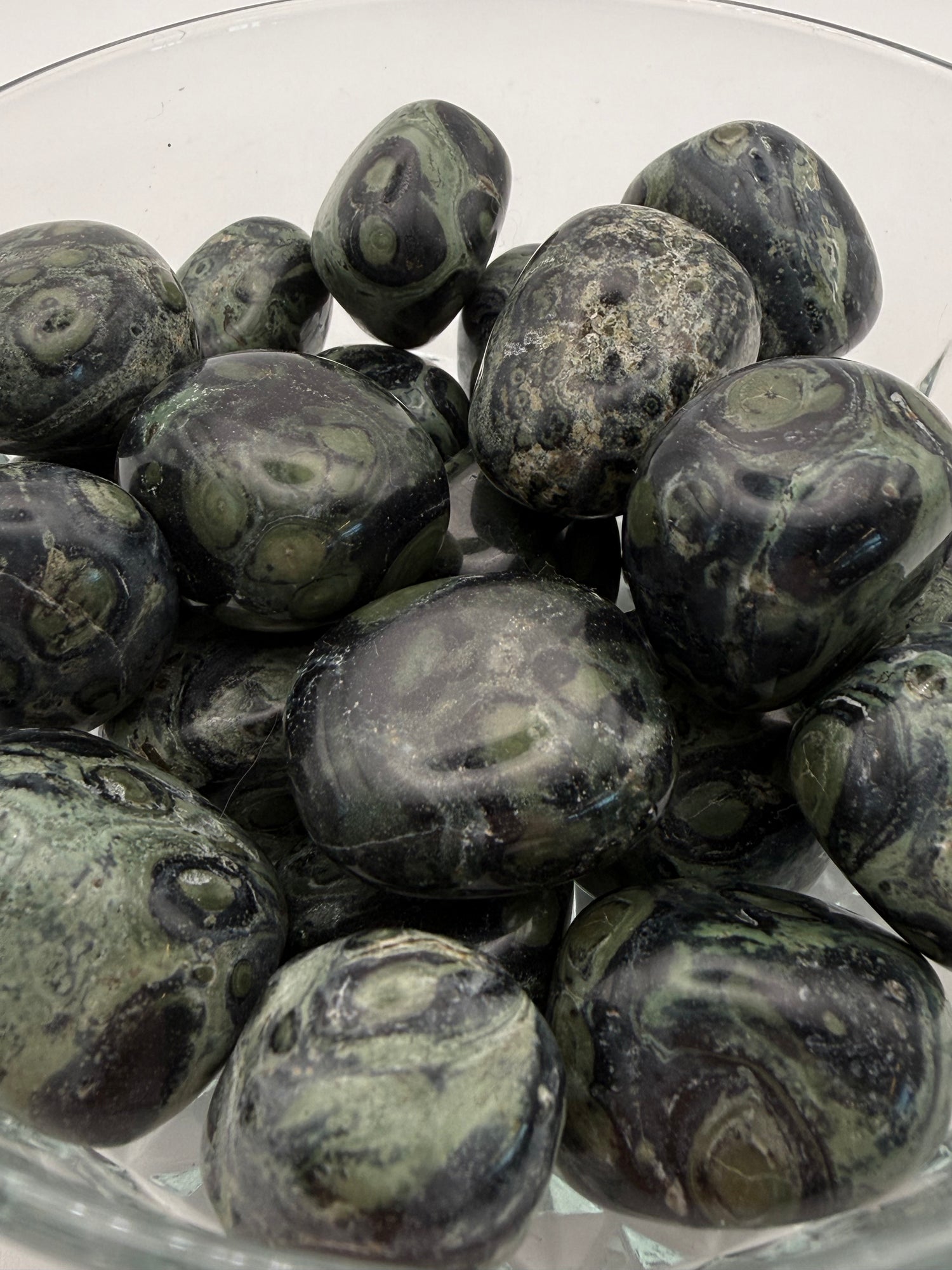 Close-up of polished kambaba jasper tumbles.