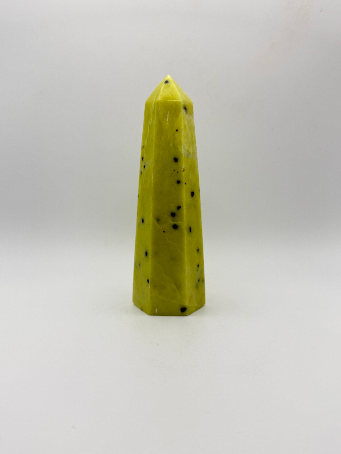 Polished healerite six sided tower.