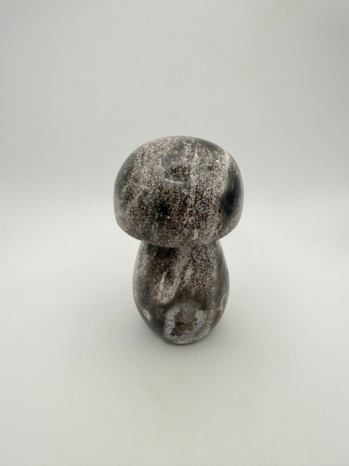 Ocean jasper stone in the shape of a mushroom.