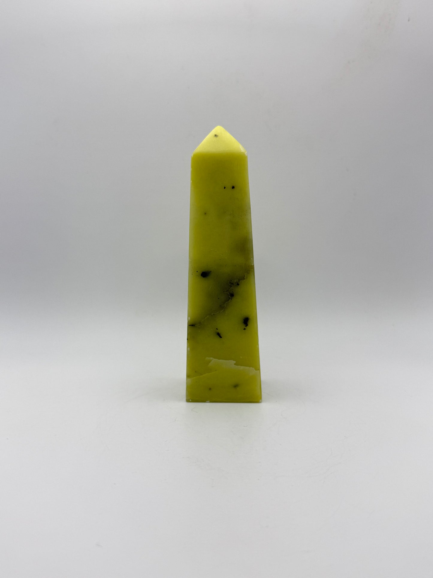 Polished healerite four sided tower.