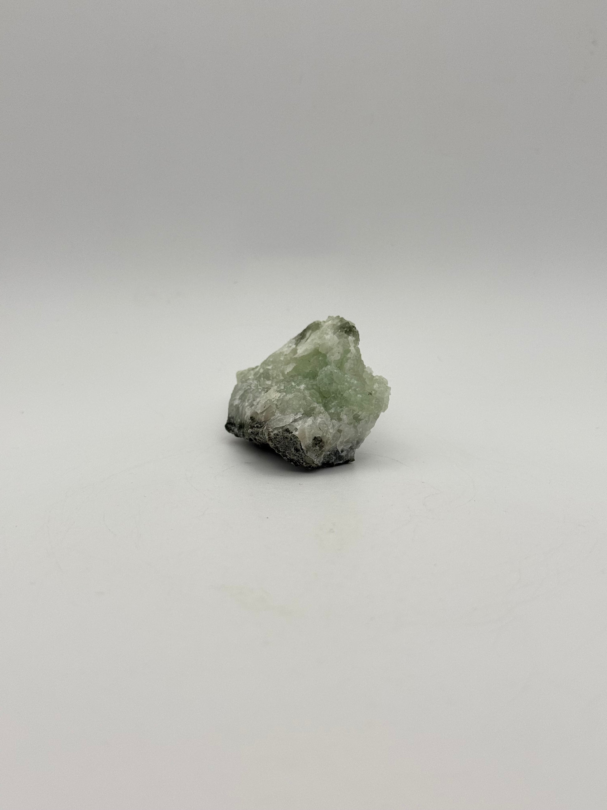 Raw prehnite specimen with amazing green color.