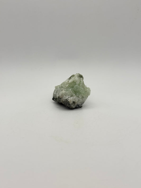 Raw prehnite specimen with amazing green color.