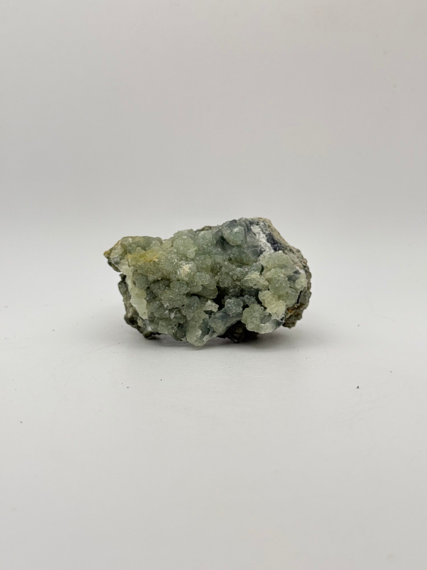 Raw prehnite specimen with amazing green color.
