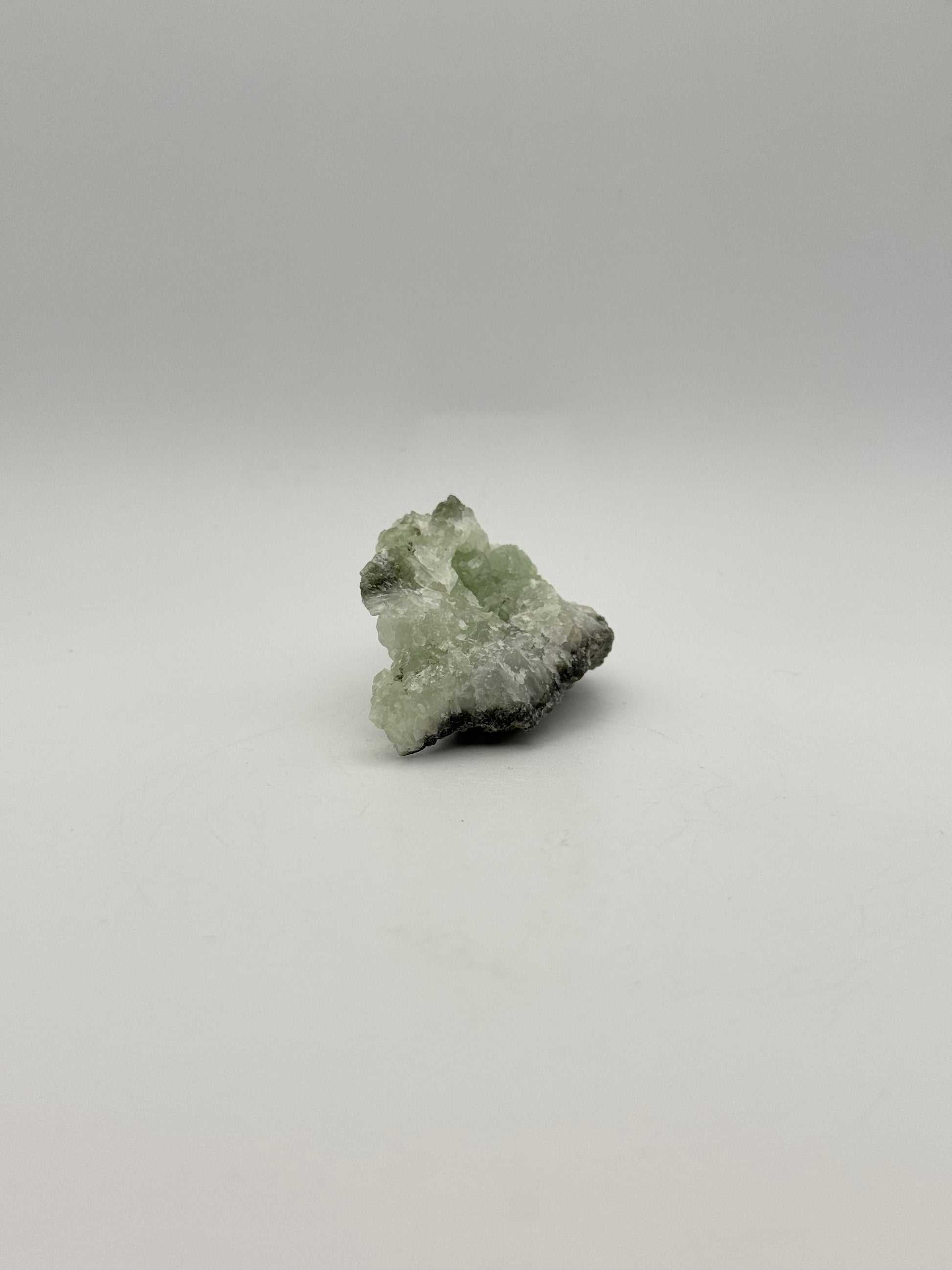 Raw prehnite specimen with amazing green color.