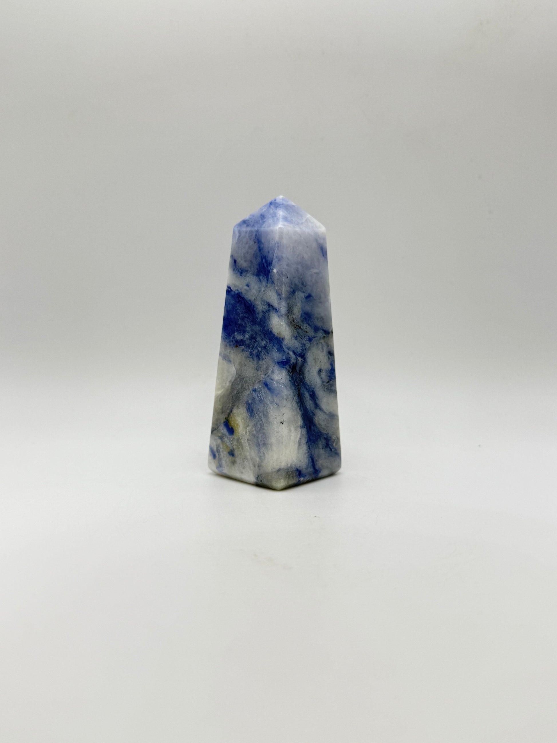 Afghanite four sided tower. Height of 3 1/2 inches, width of 1 1/4 inches.