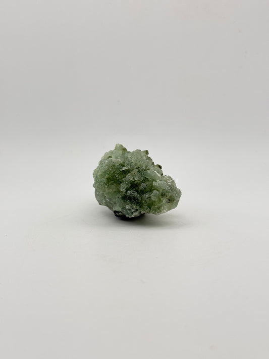 Raw Prehnite specimen with amazing green color.