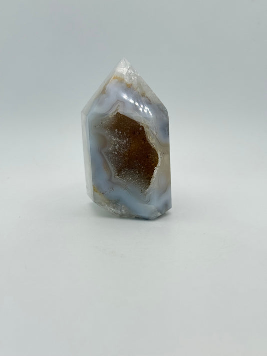 Polished druzy agate tower.