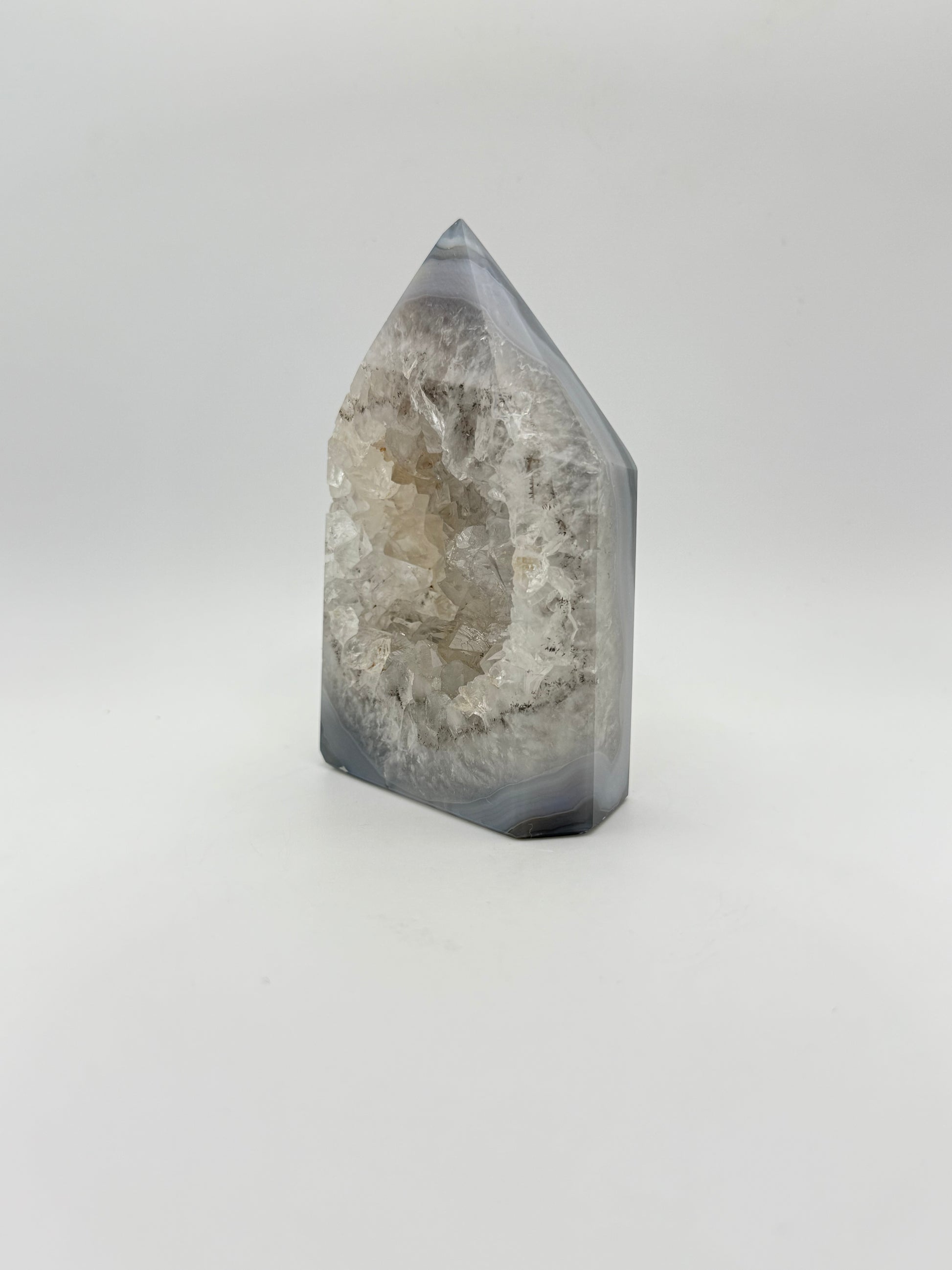 Polished druzy agate tower. a little over 4 inches tall.