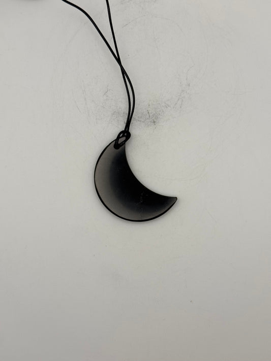 Shungite half moon pendant.