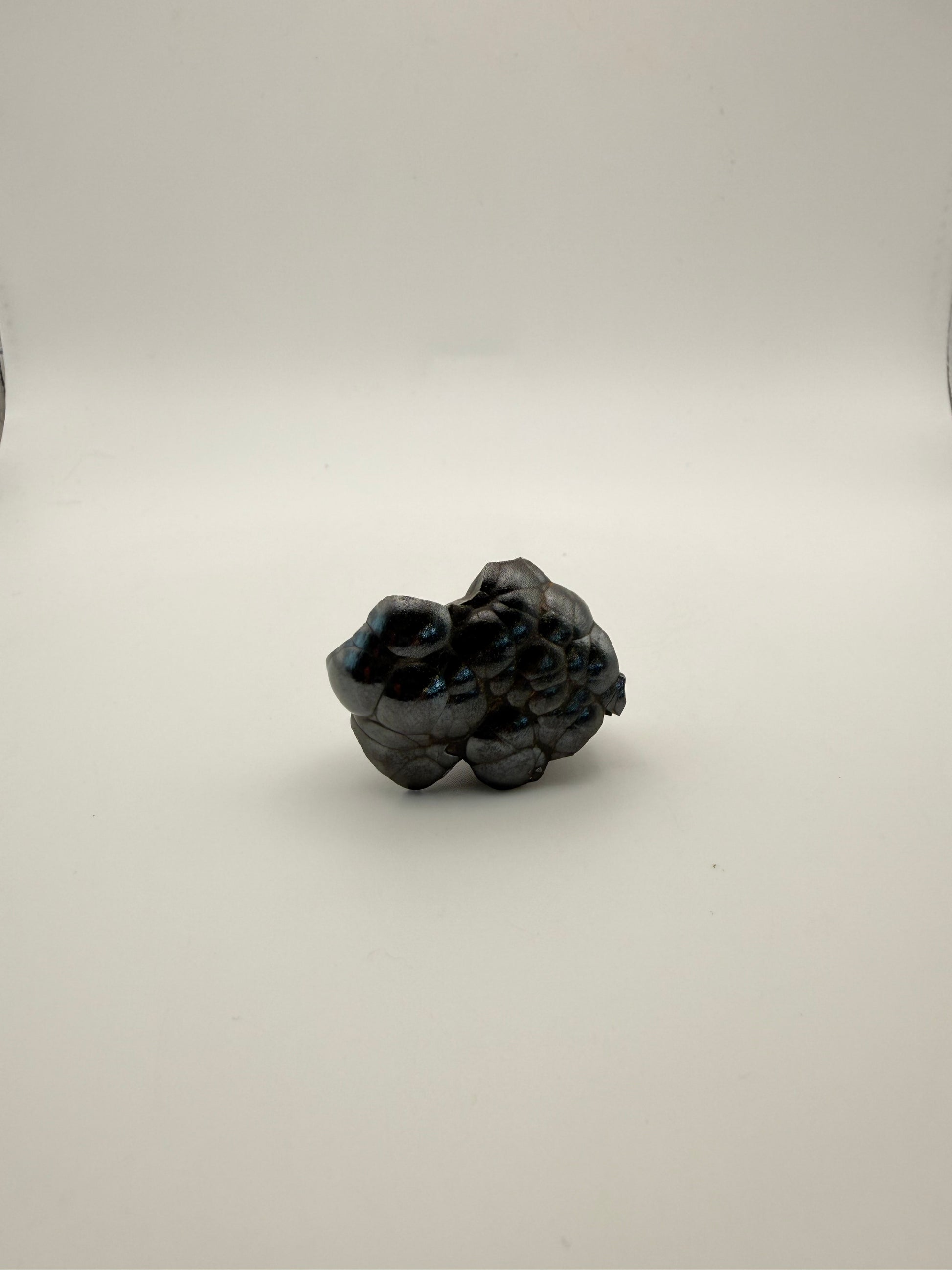 Small raw hematite specimen.