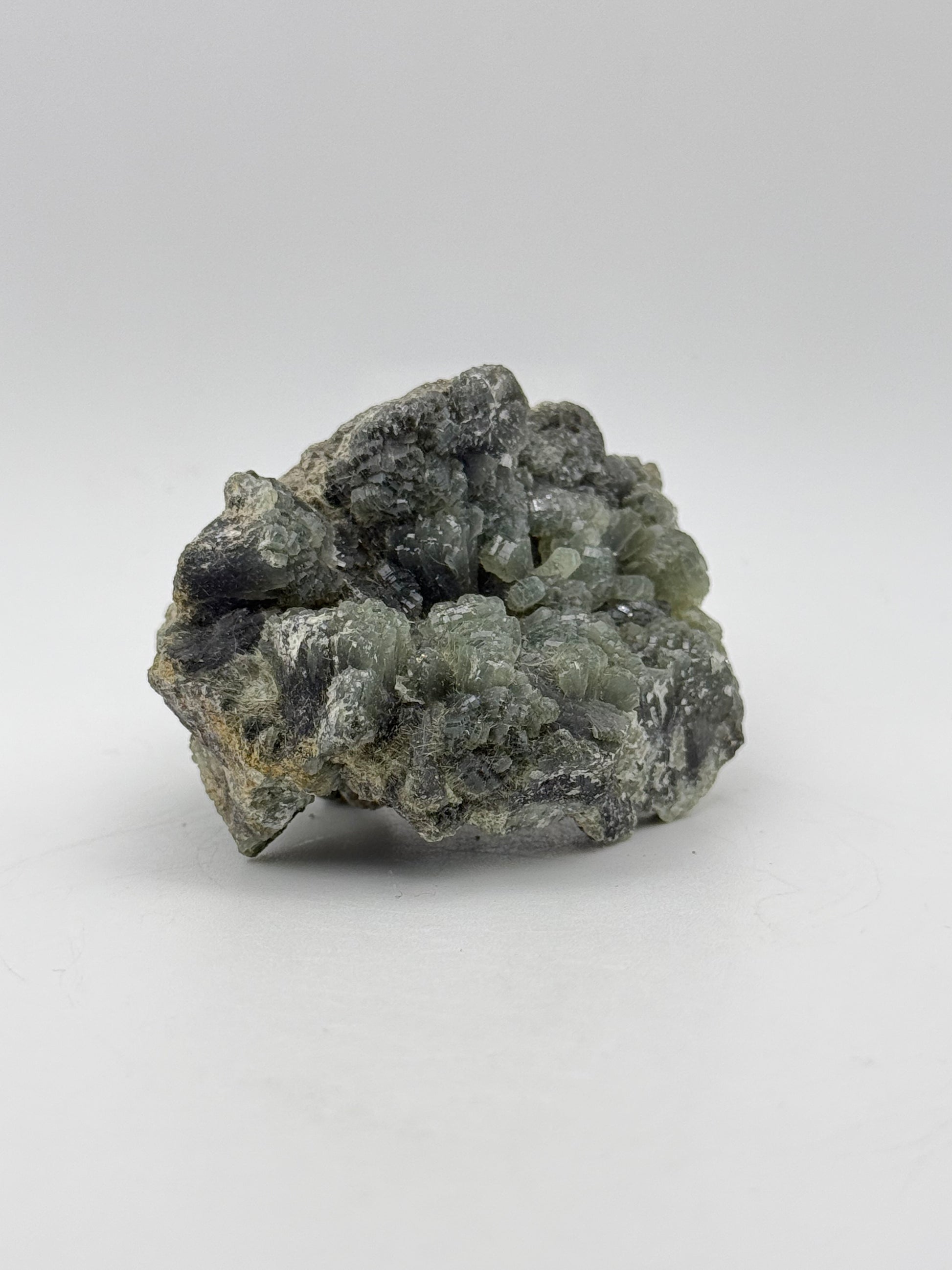 Raw prehnite specimen with amazing green color.