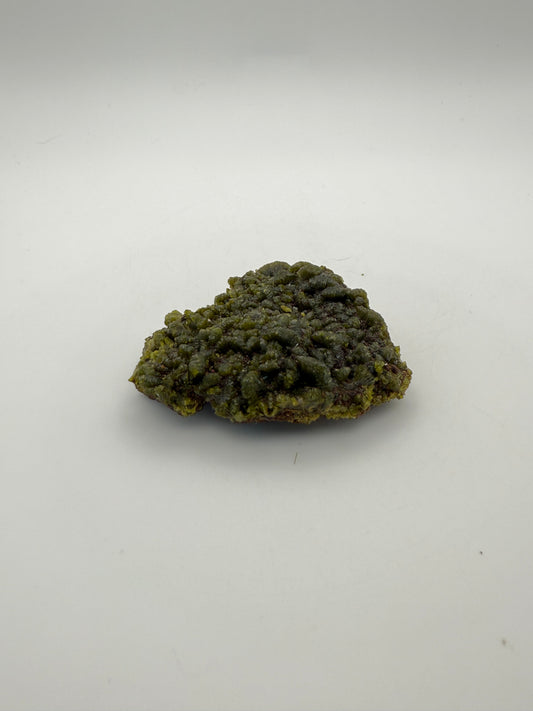 Epidote crystal cluster with good green color.