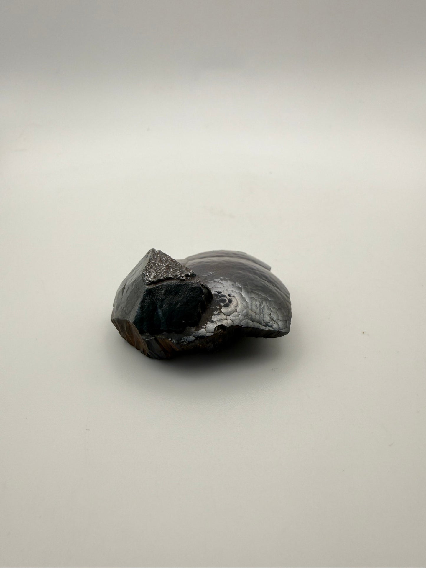 Small raw hematite specimen.