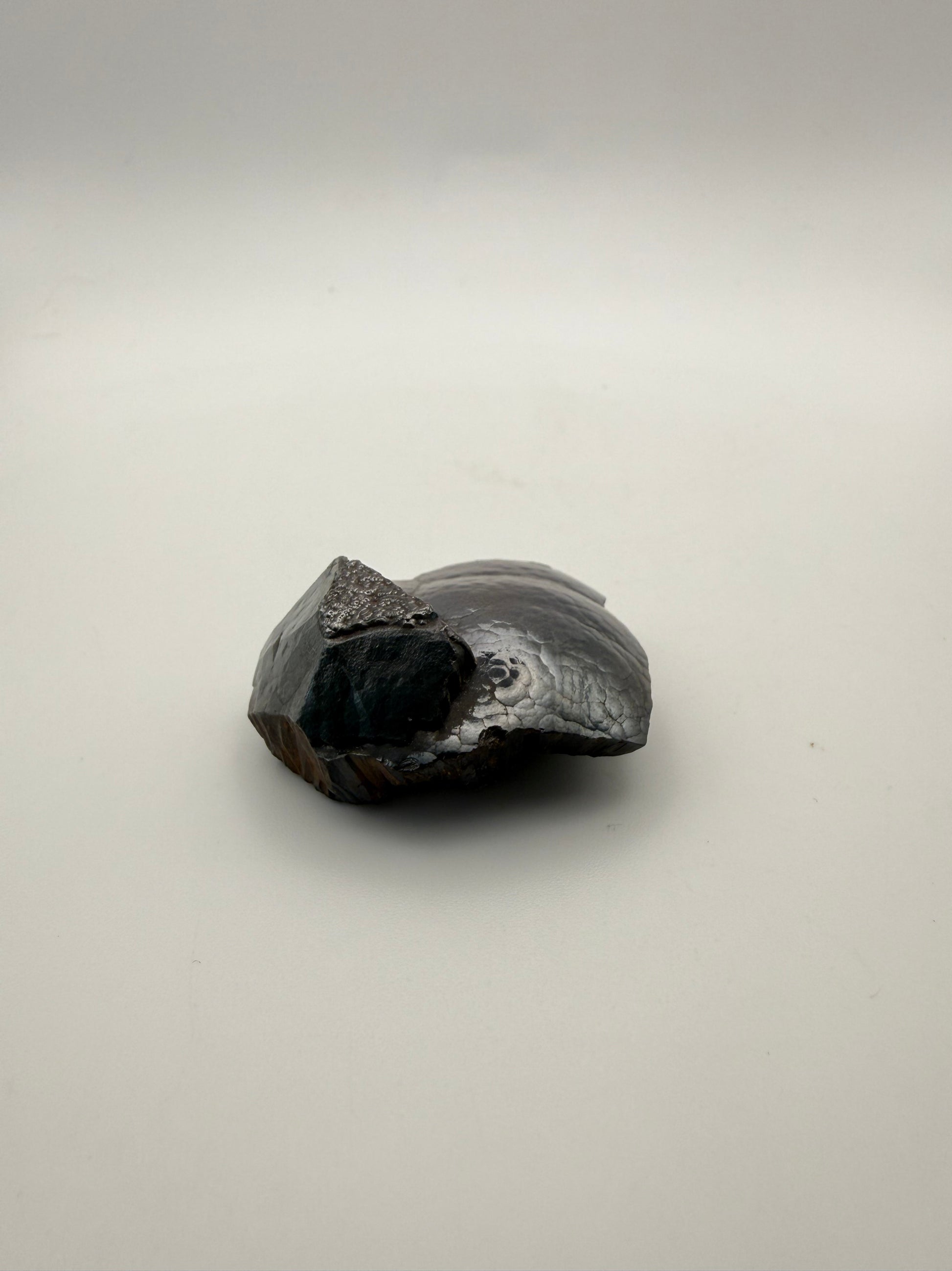 Small raw hematite specimen.