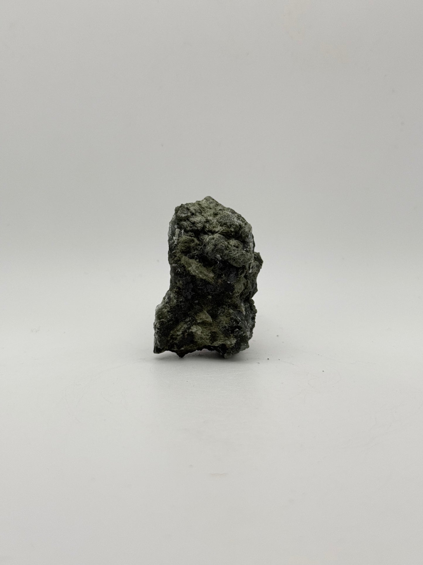 Raw prehnite specimen with amazing green color.