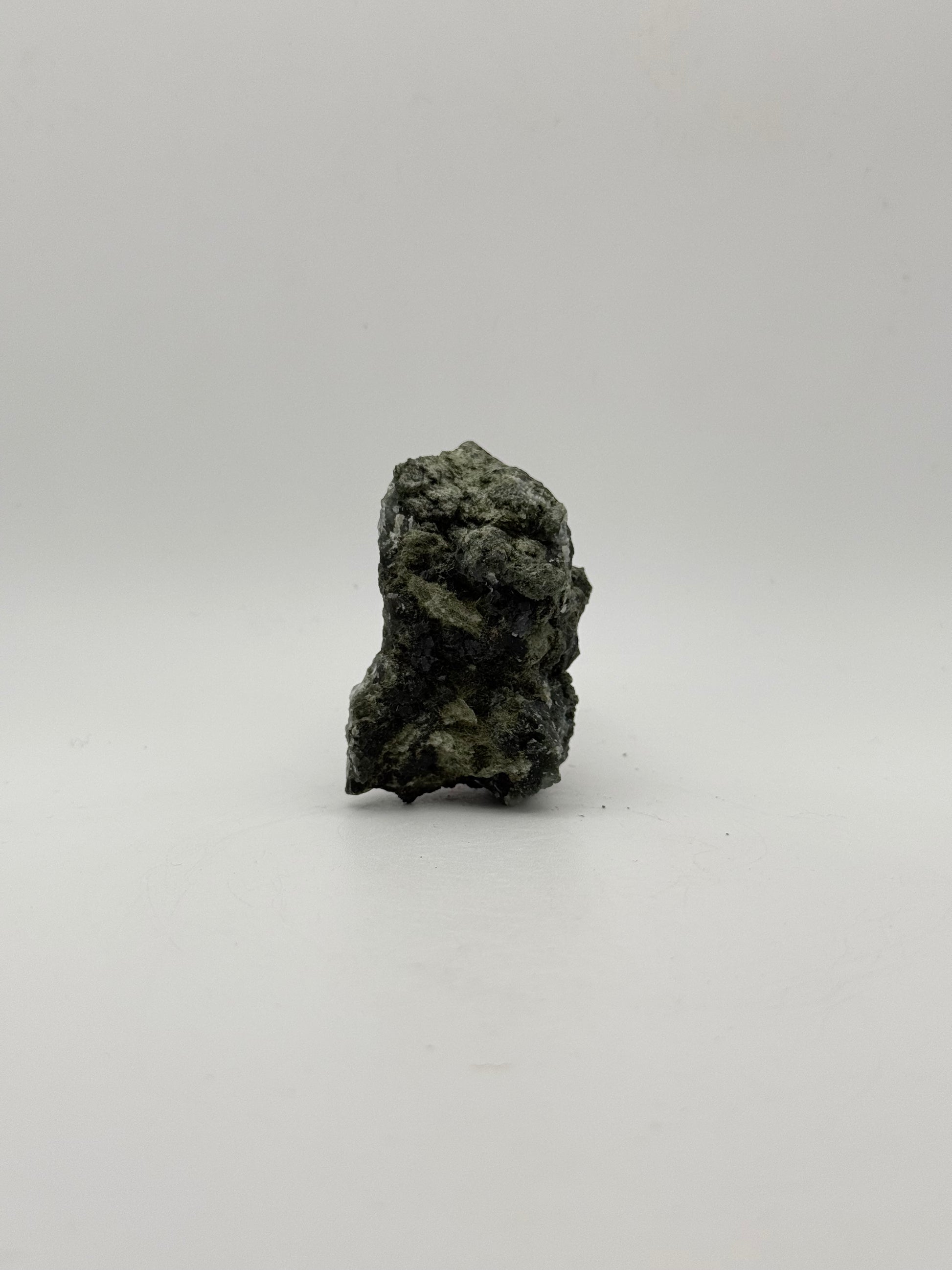 Raw prehnite specimen with amazing green color.