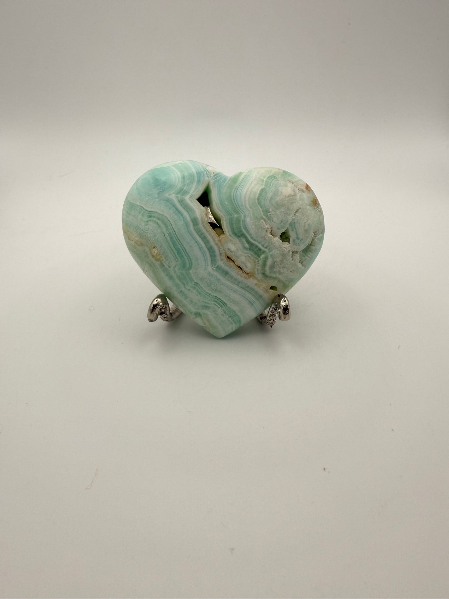 Caribbean Calcite polished crystal in the shape of a heart.