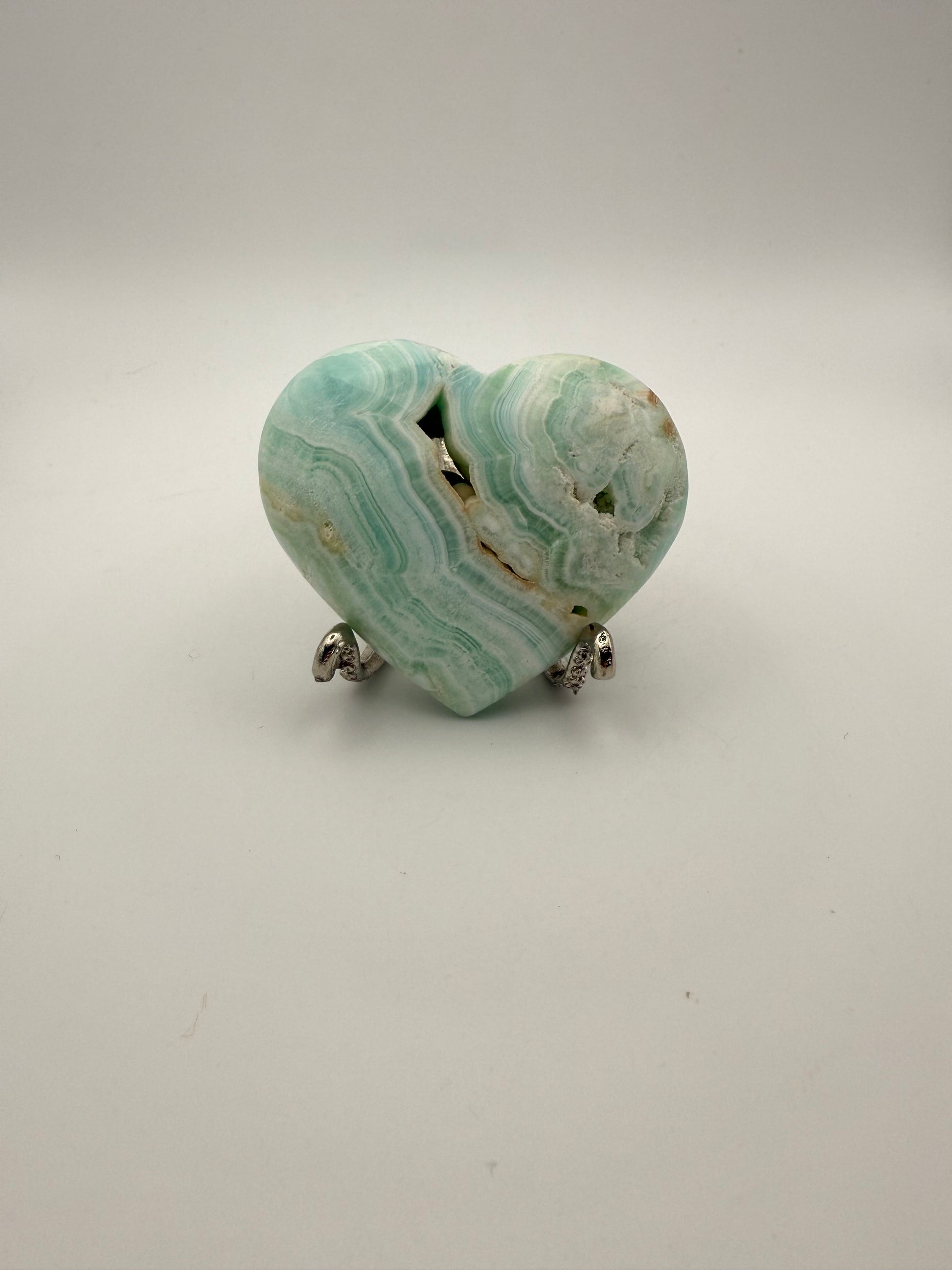 Caribbean Calcite polished crystal in the shape of a heart.