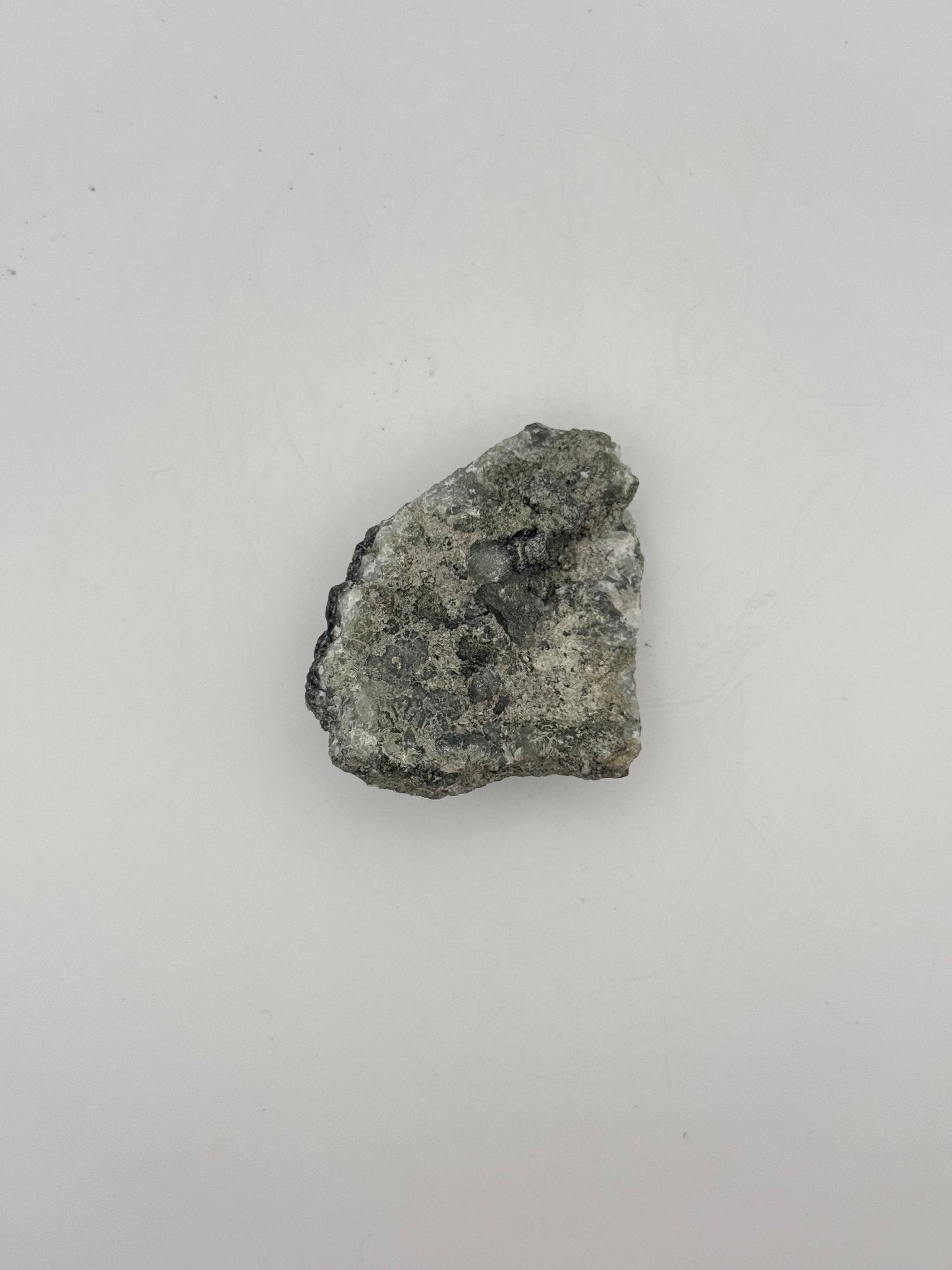 Raw prehnite specimen with amazing green color.