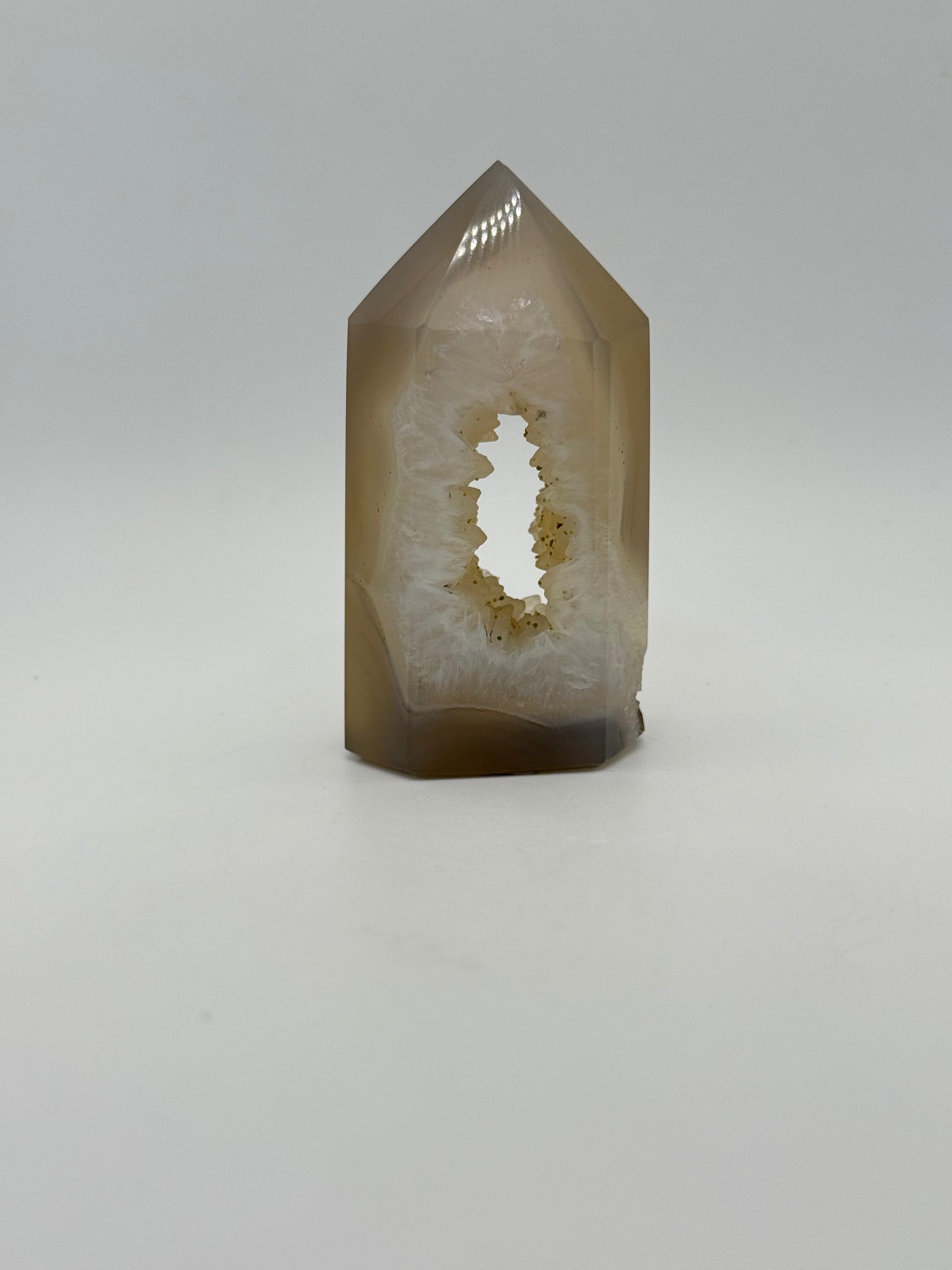 Polished druzy agate tower. About 3  inches tall.