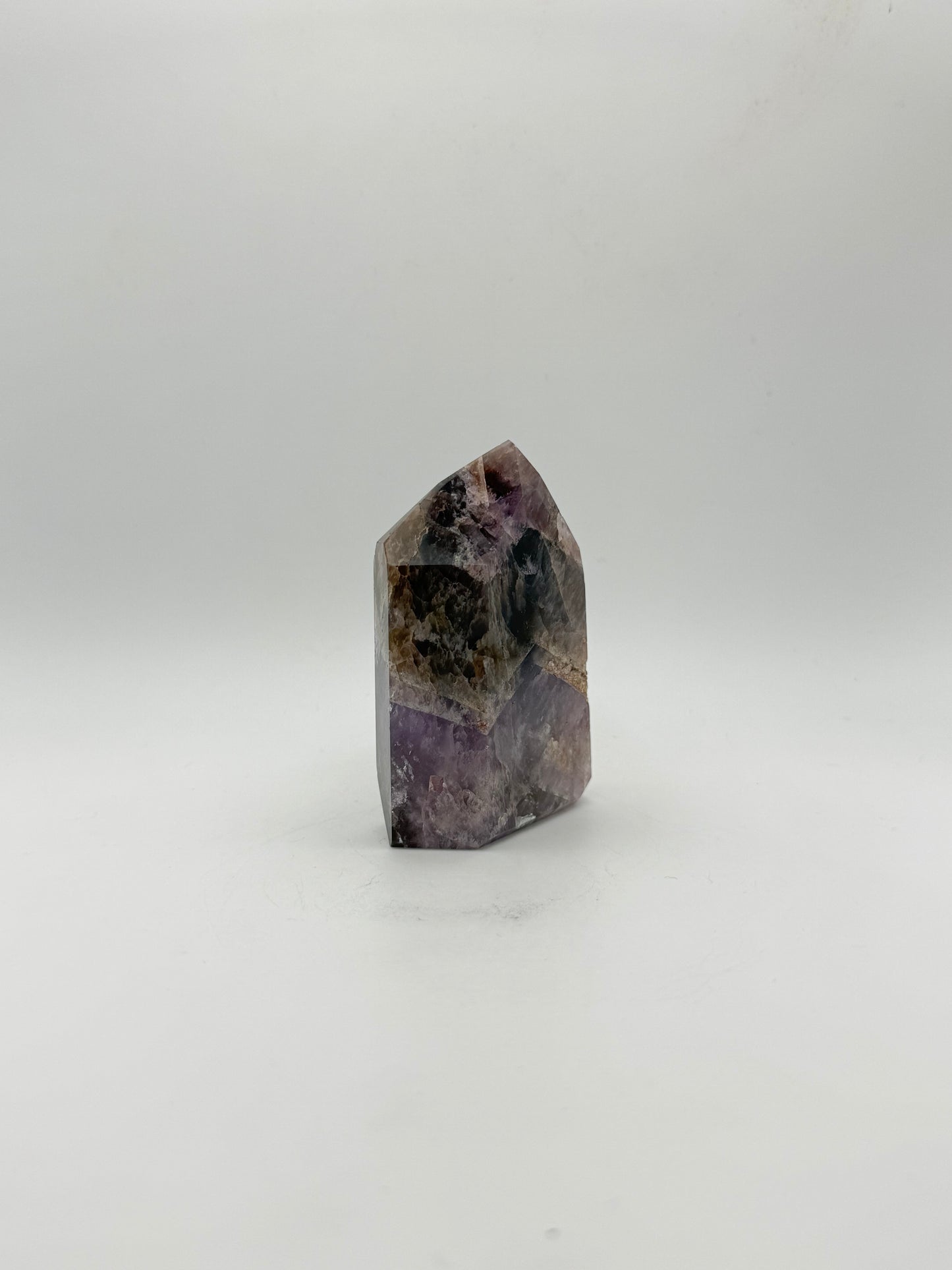 Polished super 7 in the shape of a tower.