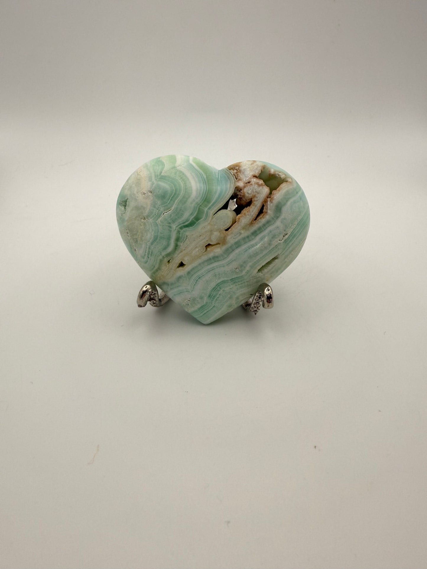 Caribbean Calcite polished crystal in the shape of a heart.