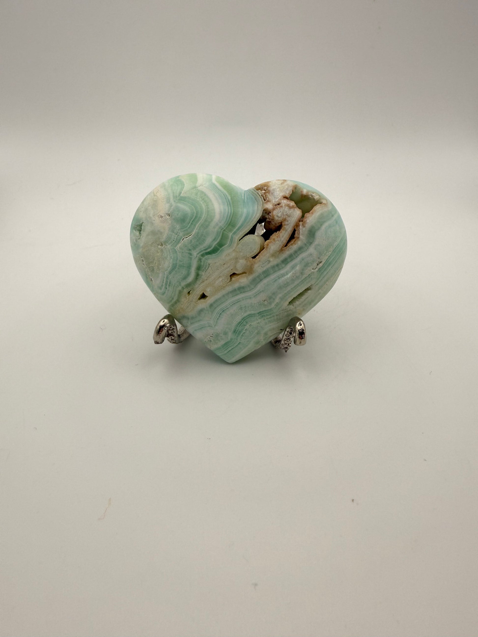 Caribbean Calcite polished crystal in the shape of a heart.