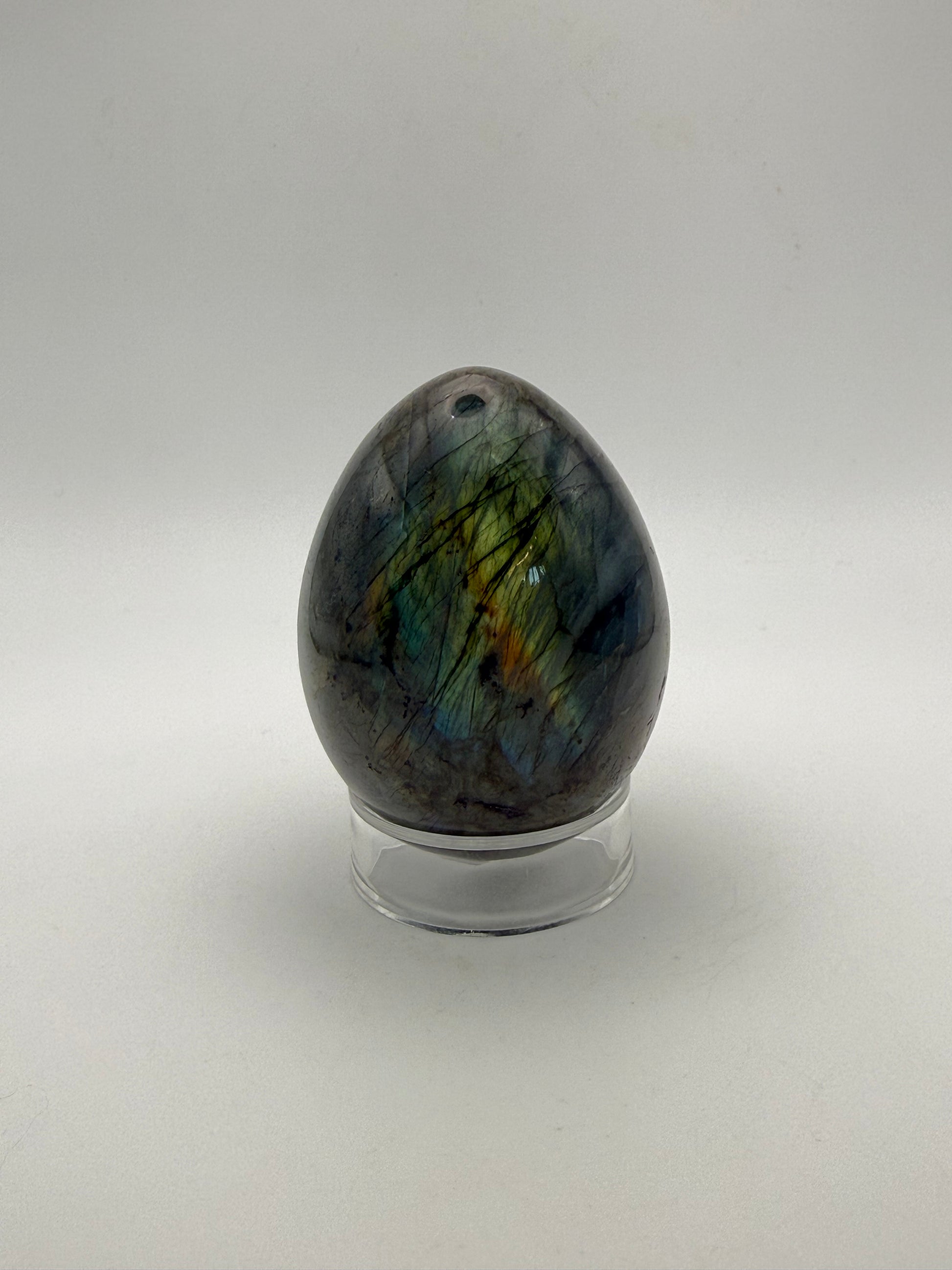 Labradorite polished stone in the shape of an egg.