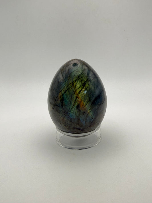 Labradorite polished stone in the shape of an egg.