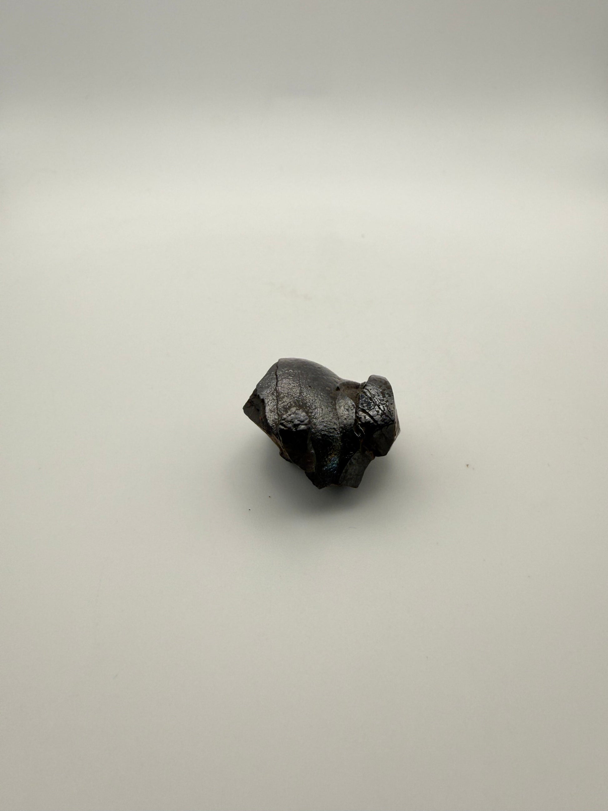 Small raw hematite specimen.