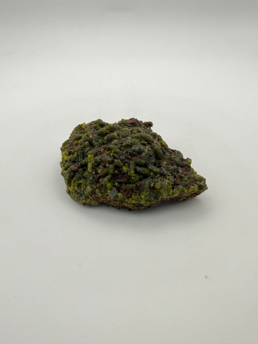 Epidote crystal cluster with good green color.