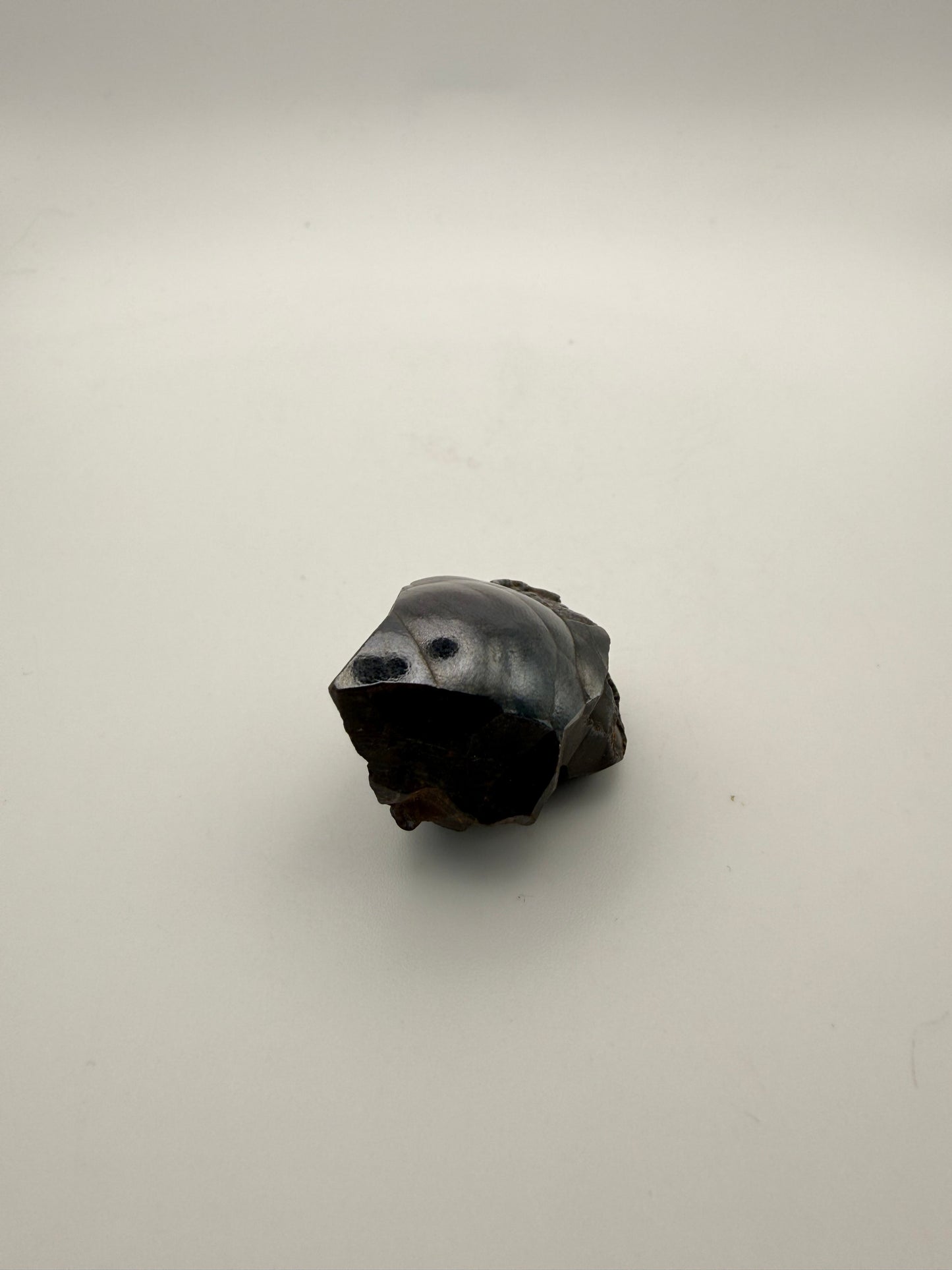 Small raw hematite specimen.