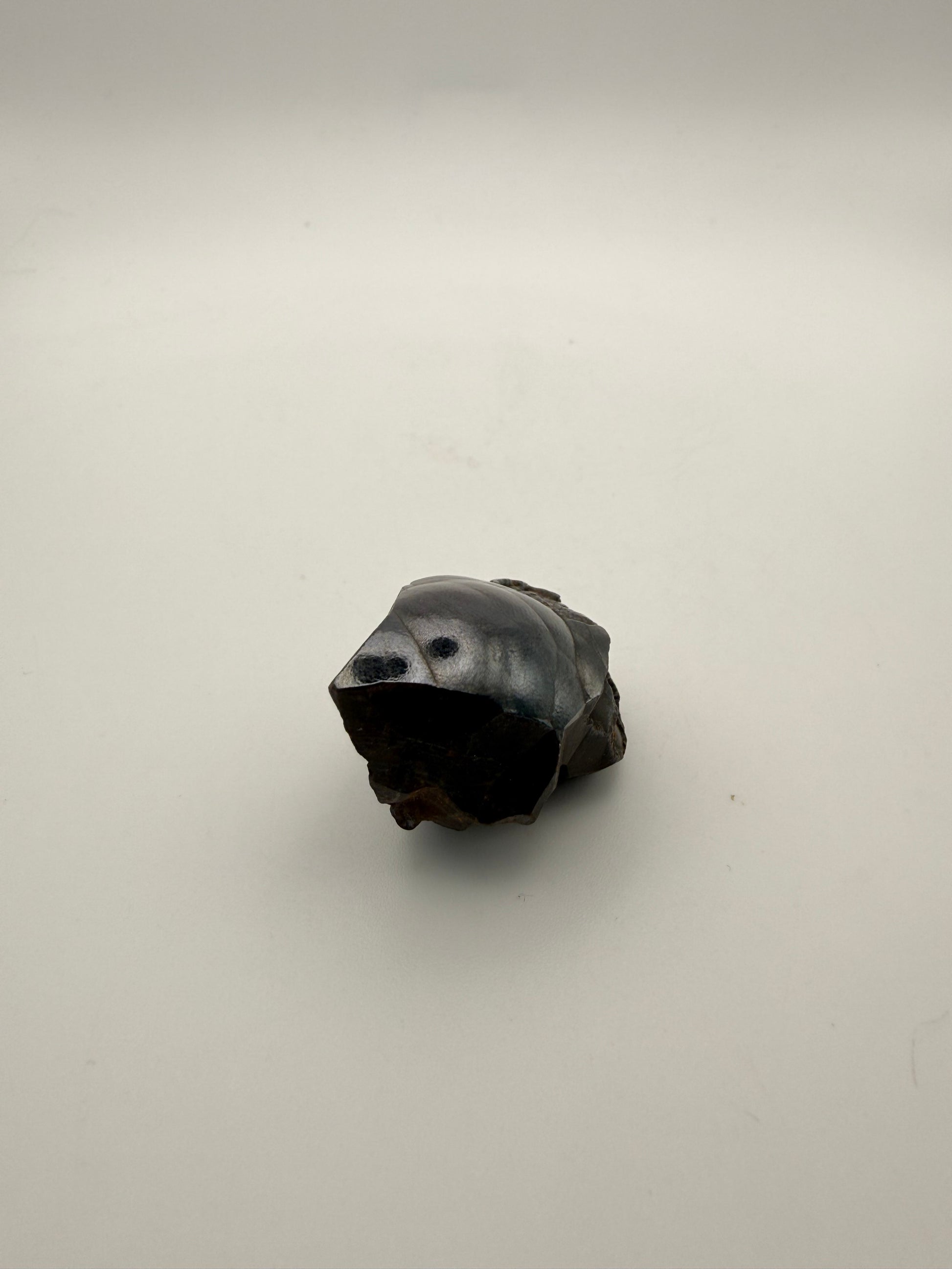 Small raw hematite specimen.