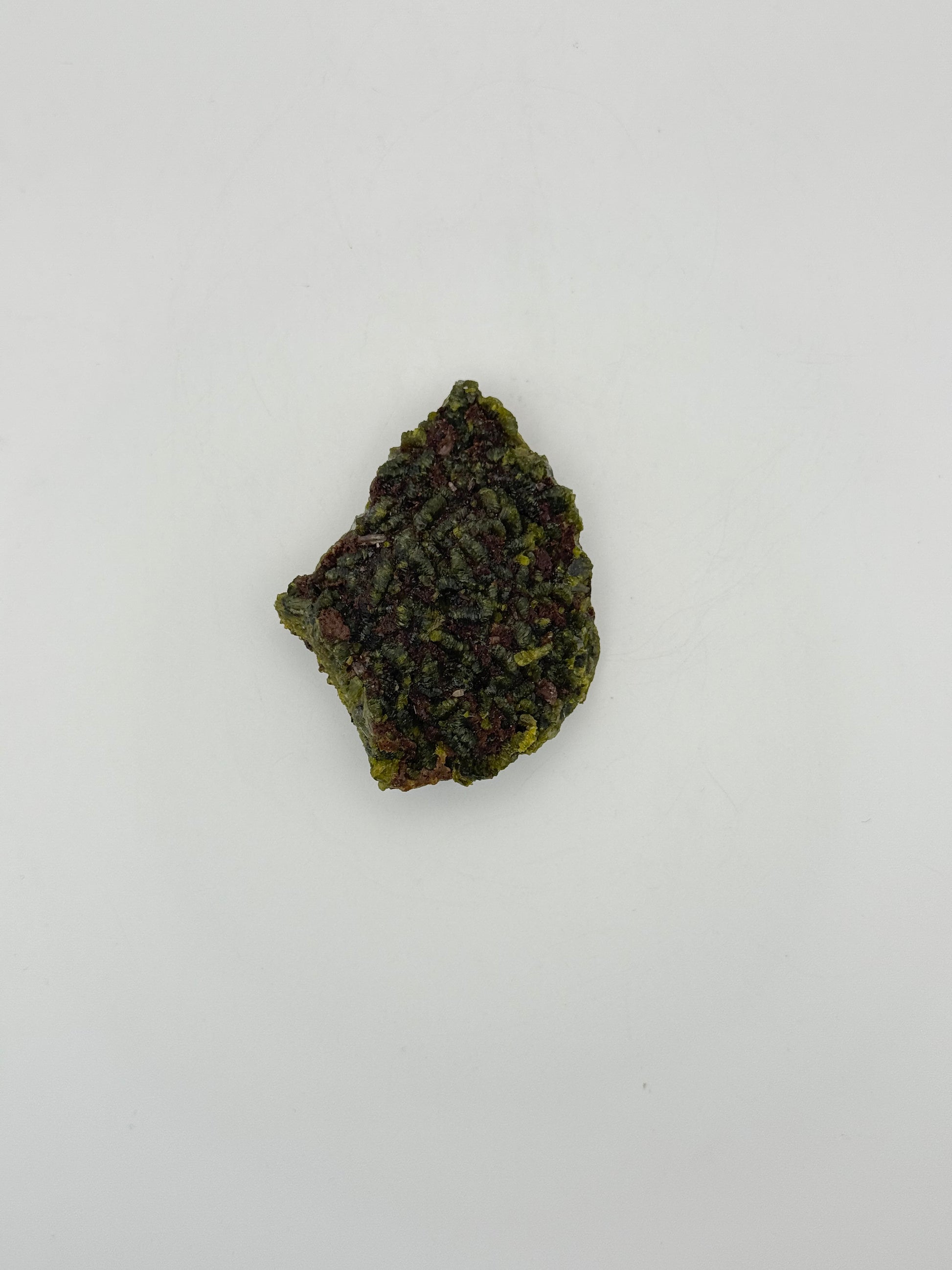 Epidote crystal cluster with good green color.