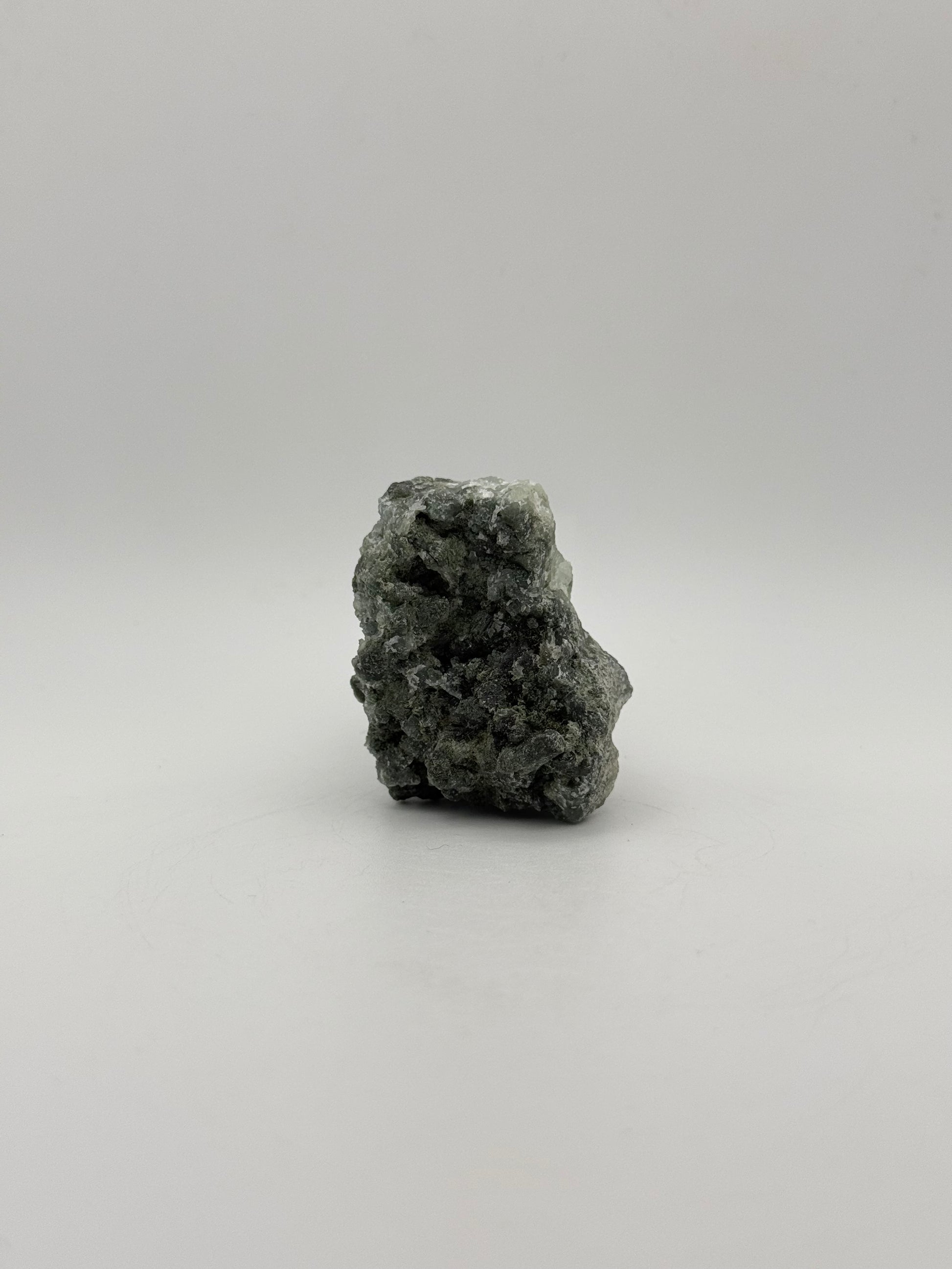 Raw prehnite specimen with amazing green color.