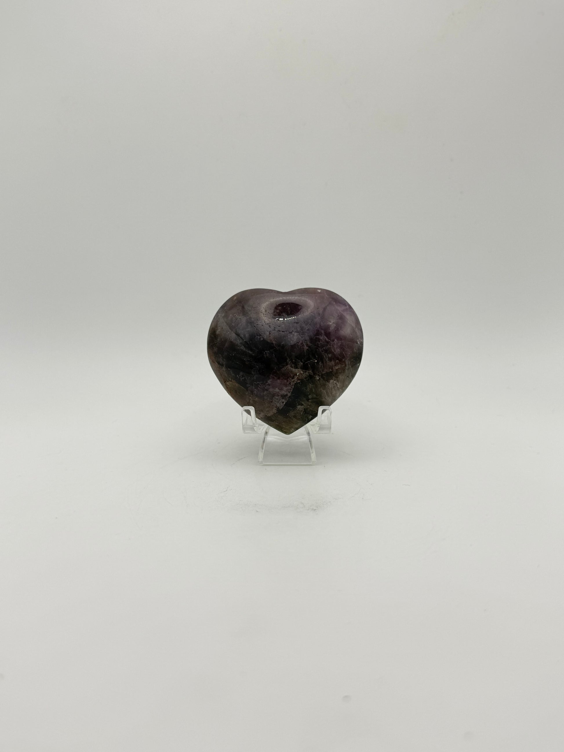 Polished super 7 in the shape of a heart.