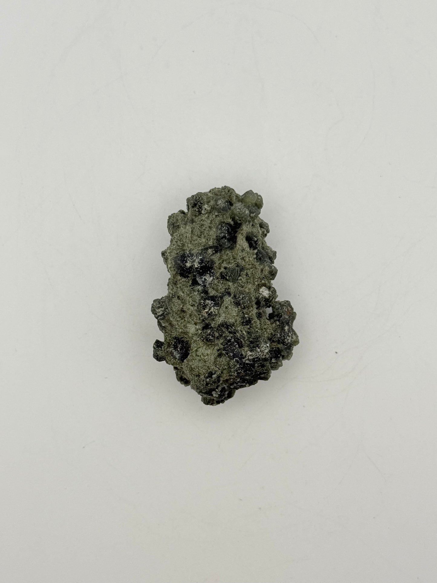 Raw prehnite specimen with amazing green color.