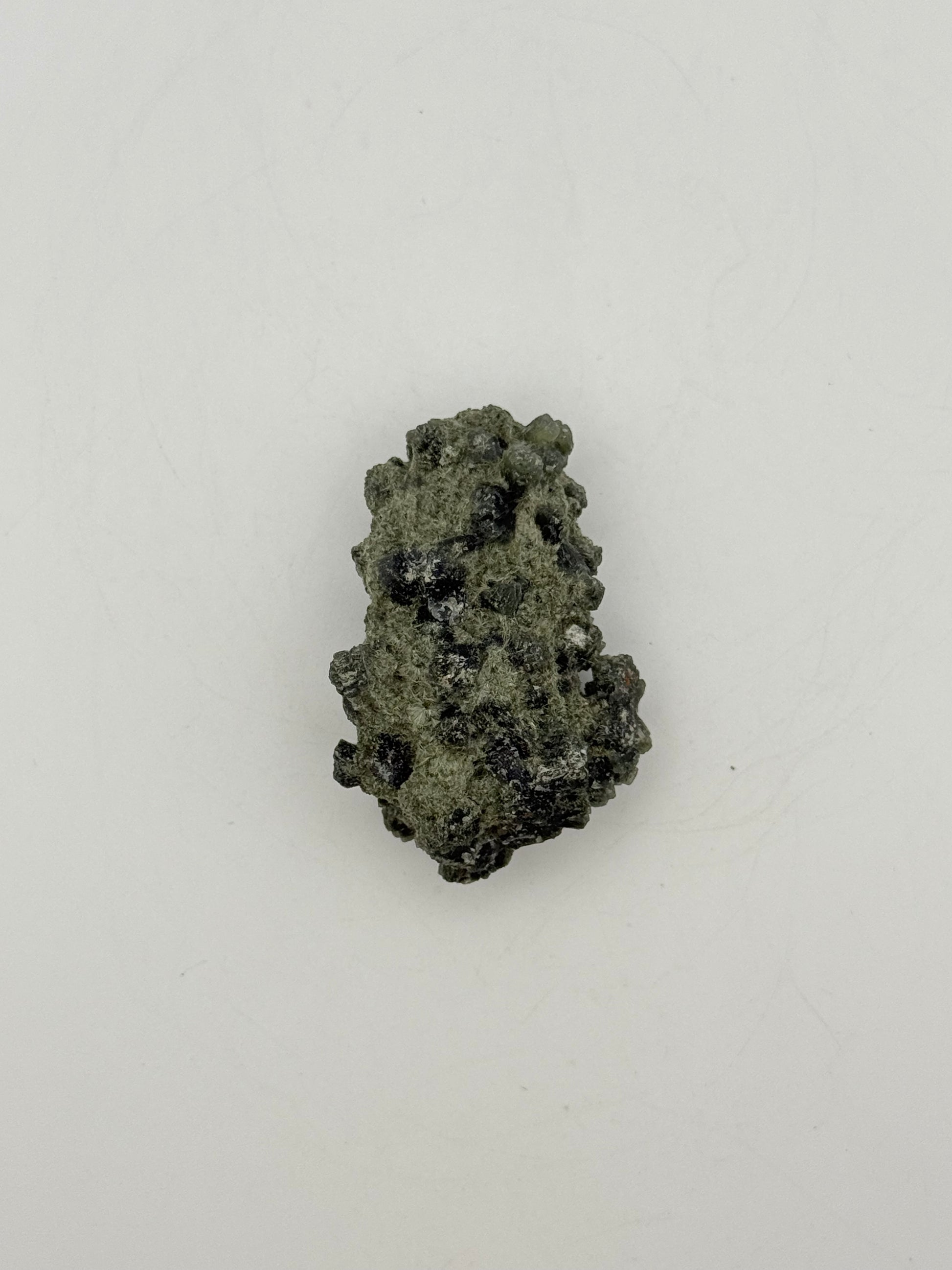 Raw prehnite specimen with amazing green color.