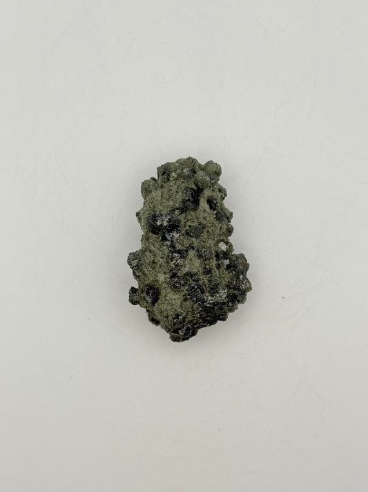 Raw prehnite specimen with amazing green color.