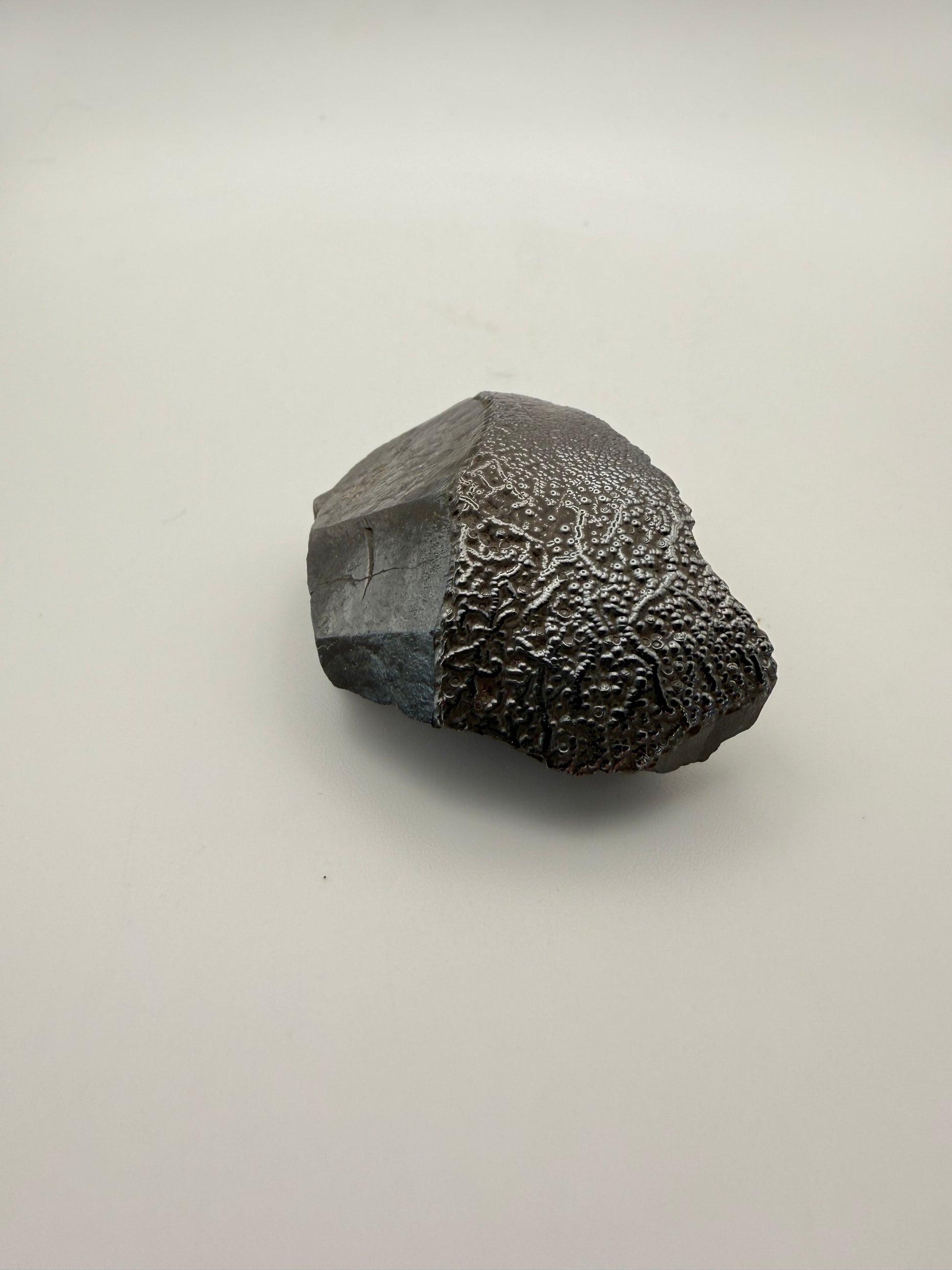 Small raw hematite specimen.