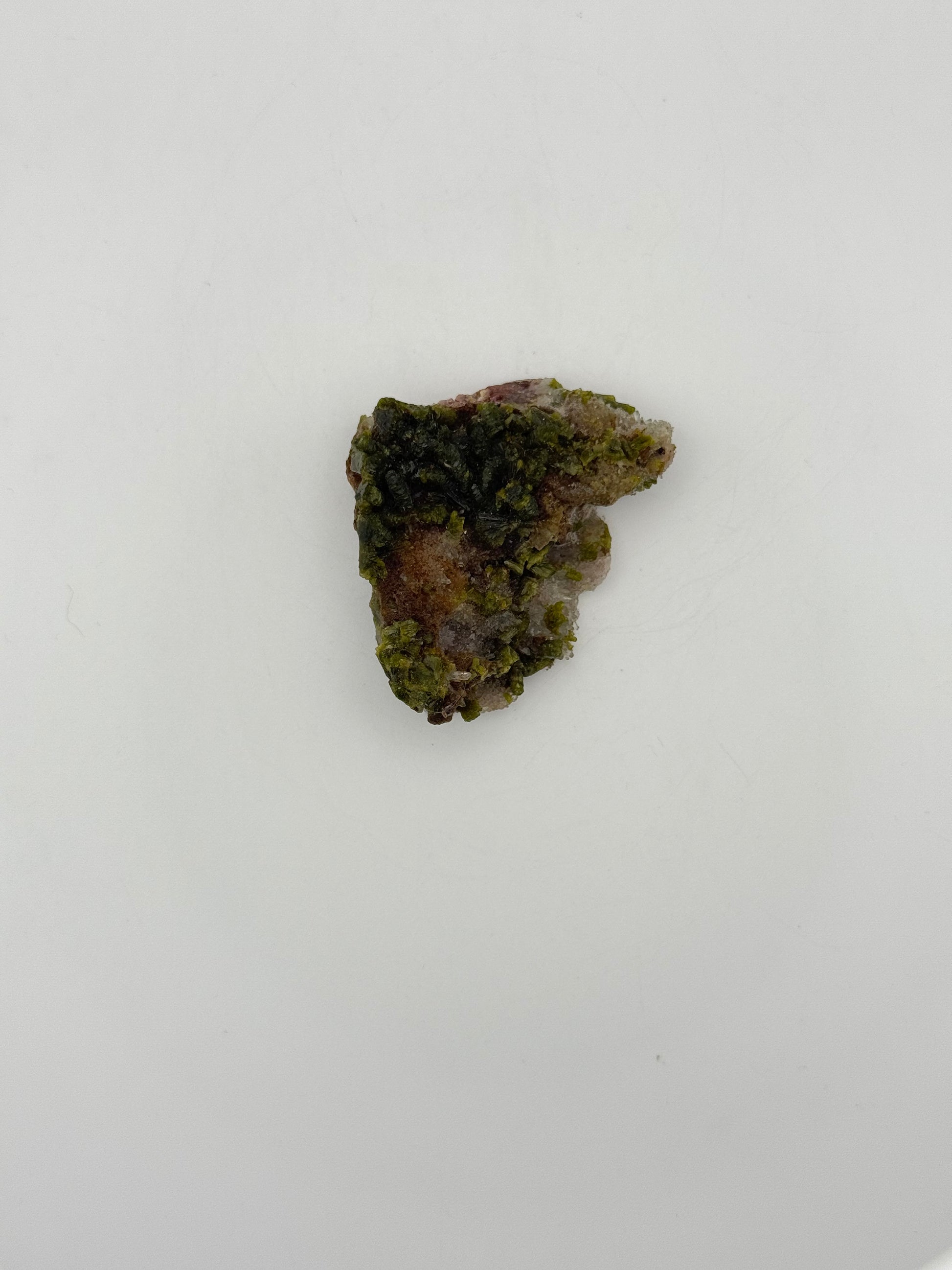 Epidote crystal cluster with good green color.