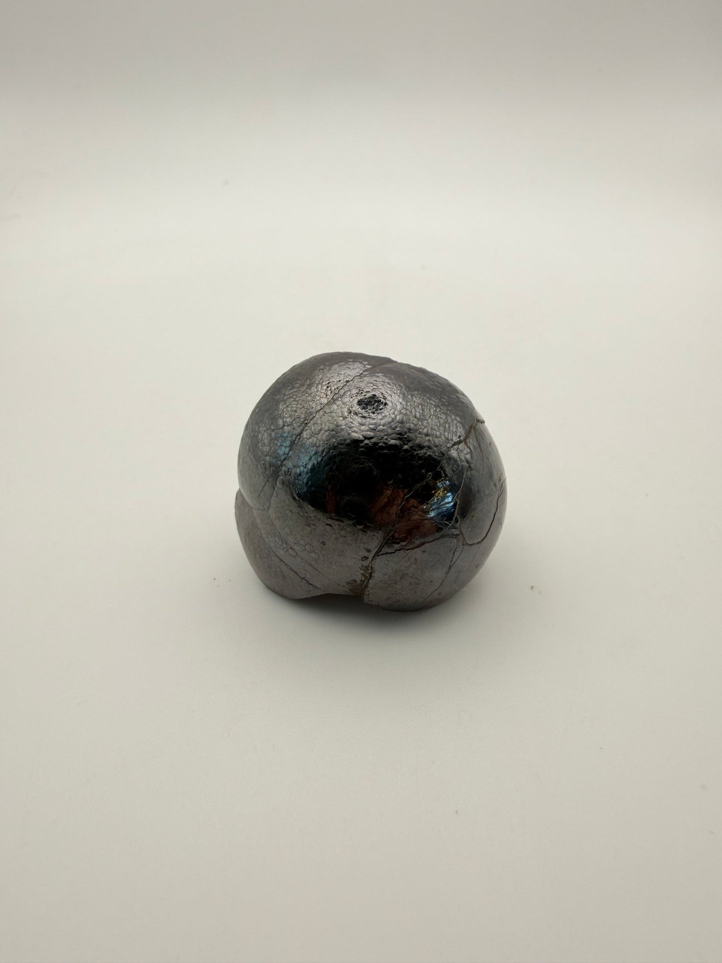 Small raw hematite specimen.