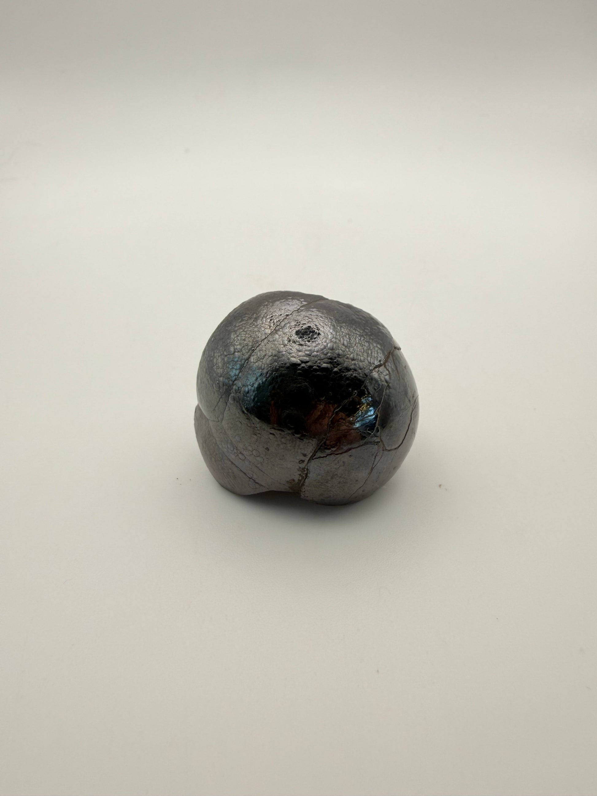 Small raw hematite specimen.