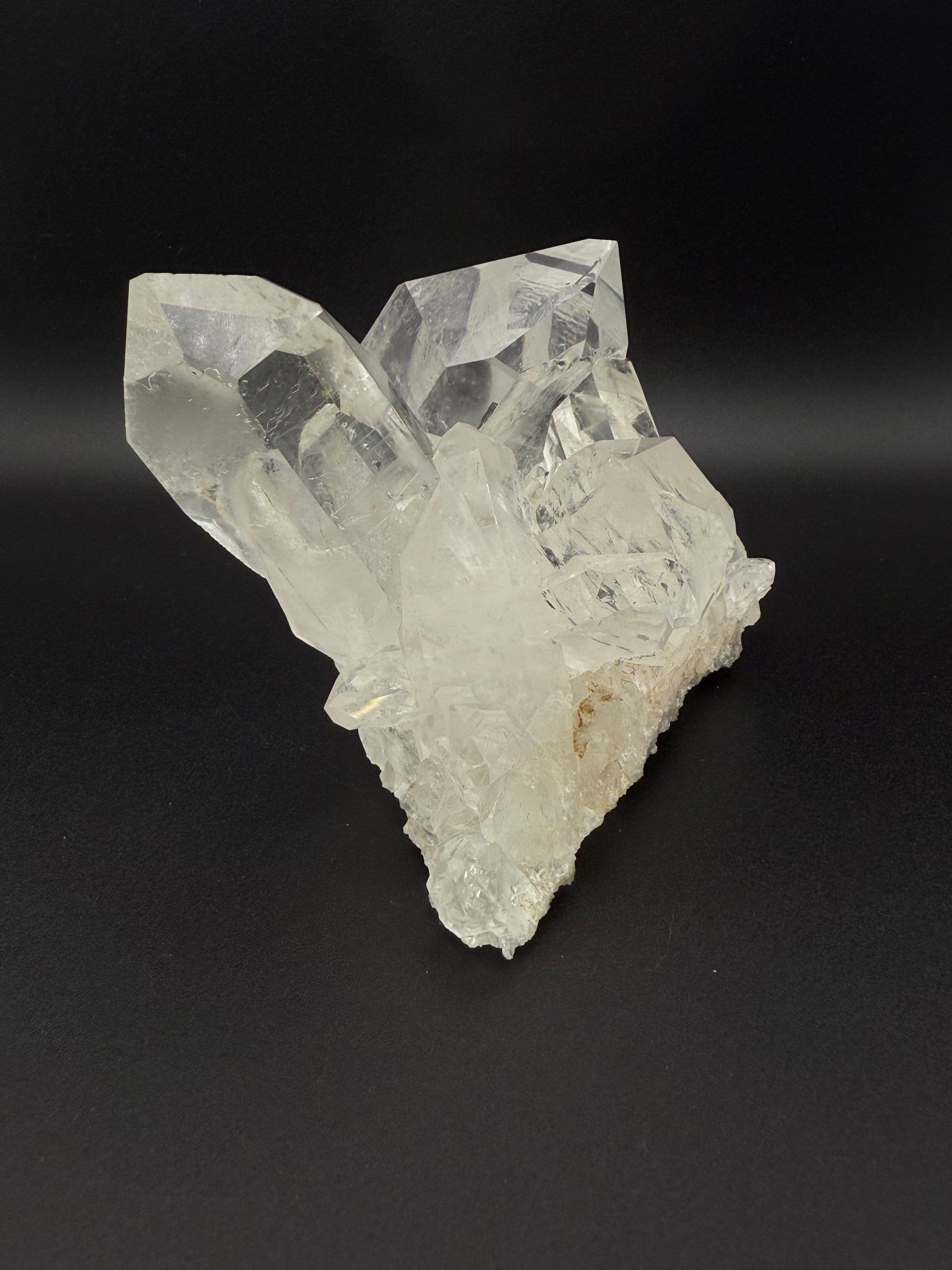 Large cluster of clear quartz crystals.