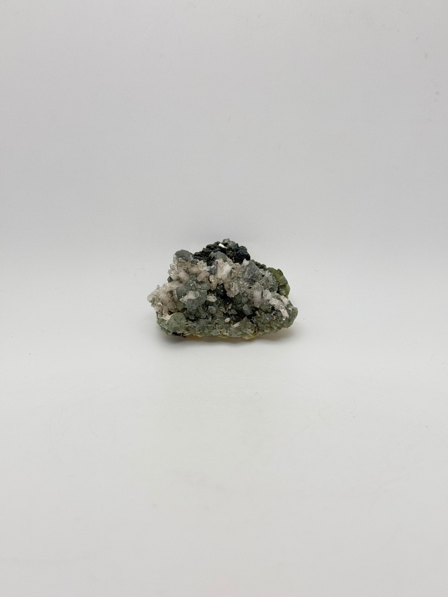 Raw prehnite specimen with amazing green color.