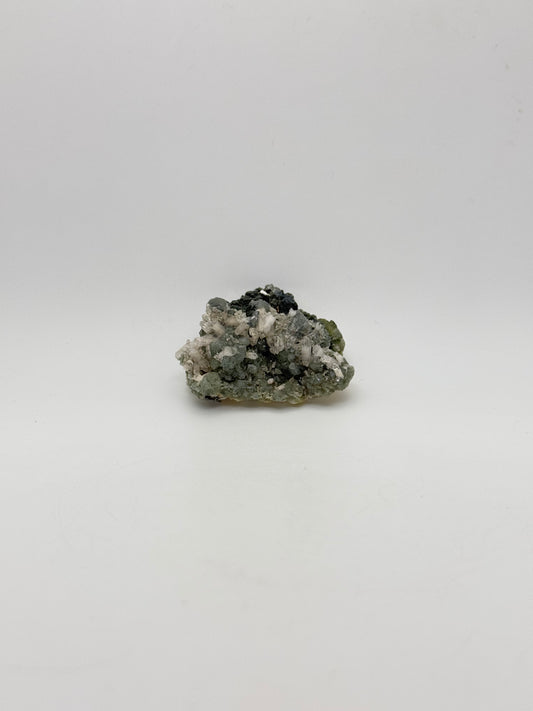 Raw prehnite specimen with amazing green color.