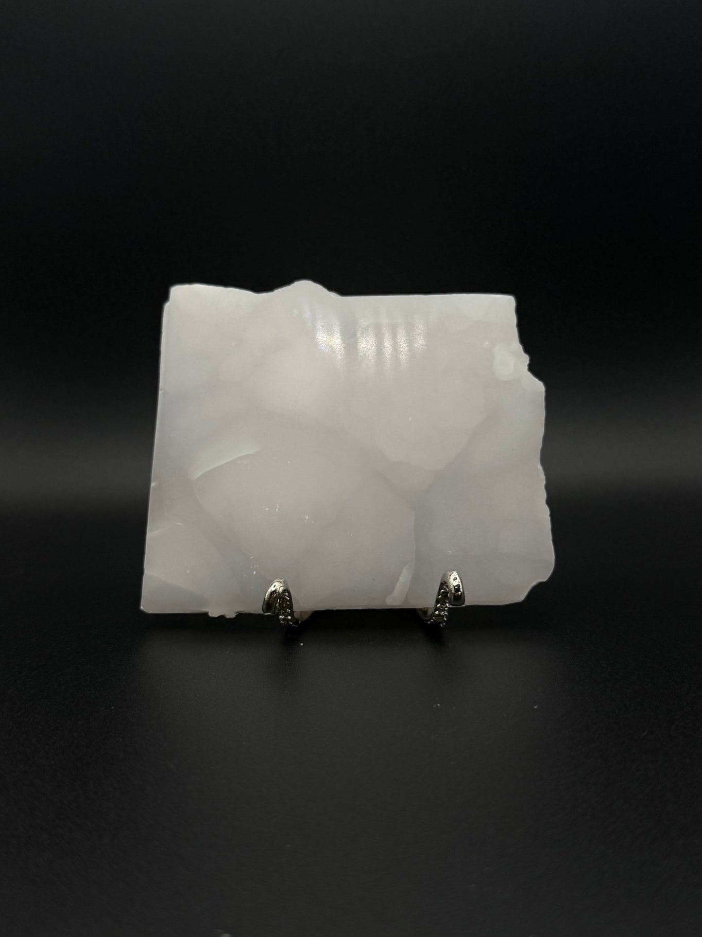 Polished pink calcite slab. Pink calcite glows under uv light.