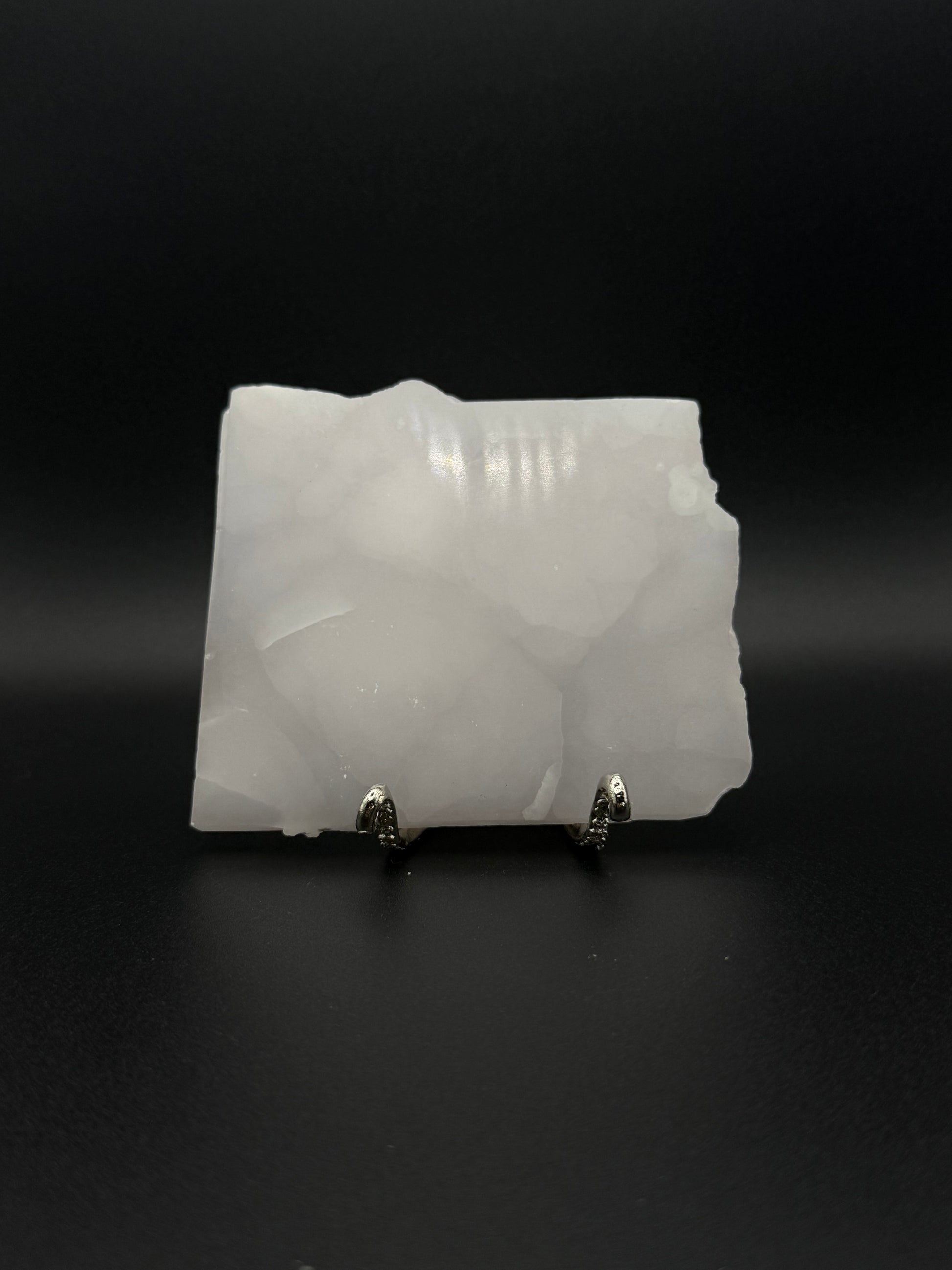 Polished pink calcite slab. Pink calcite glows under uv light.