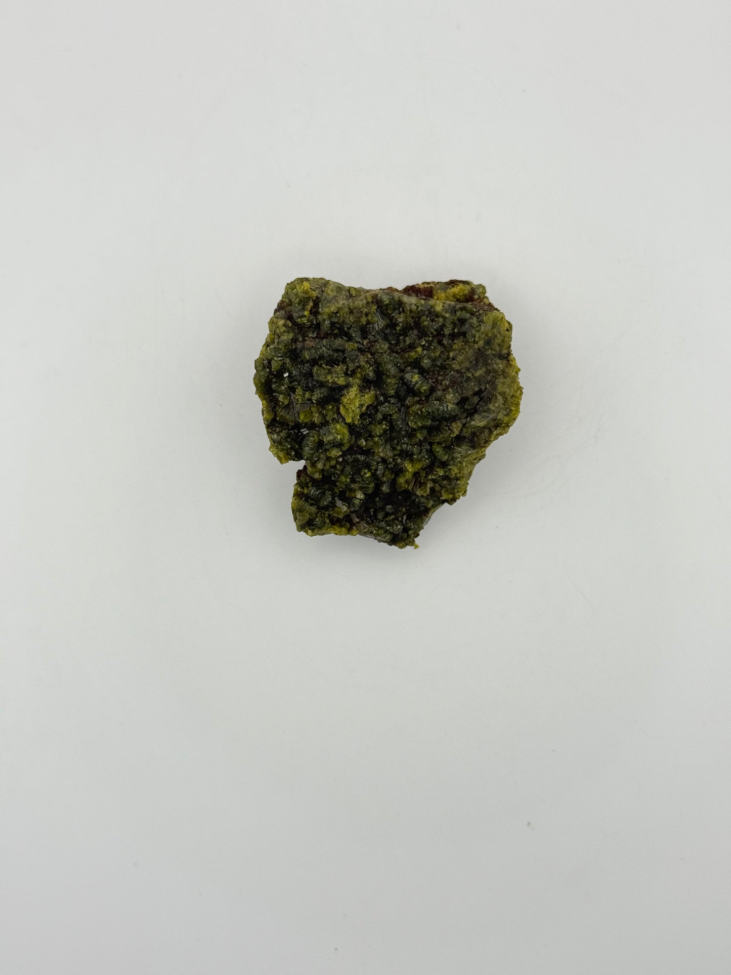 Epidote crystal cluster with good green color.