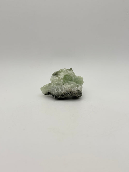 Raw prehnite specimen with amazing green color.
